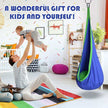 Colorful sensory swing pod in a cozy room, perfect for kids and relaxation.