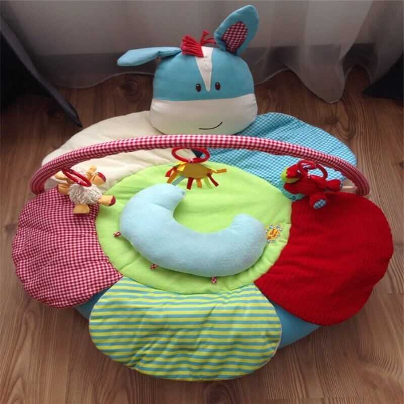 Colorful baby inflatable play mat with interactive toys and soft fabric for safe crawling and sensory play.