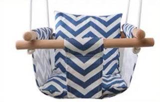 Toddler swing chair with blue and white chevron pattern, featuring comfortable cushions and sturdy wooden support.