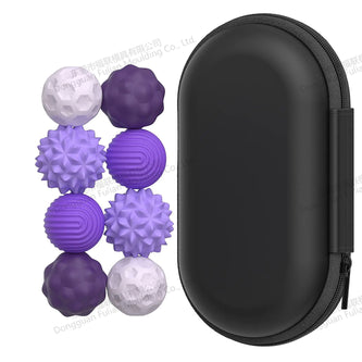 Set of purple and white textured balls with a black carrying case on a white background